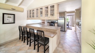 Kitchen breakfast bar with granite worktop and bar stools, 149 Salters Road, Barbados