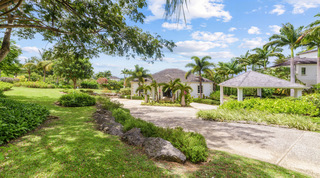 Sweeping driveway, covered carport and lawns at Bella Vista, private villa in Royal Westmoreland, Barbados