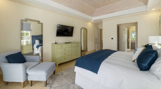 King bedroom with pale green chest and en suite beyond at Bella Vista villa, St. James, Barbados