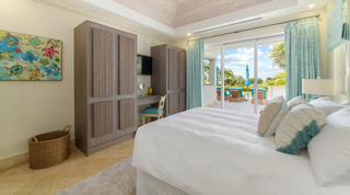 Turquoise bedroom with fitted wardrobes opening to the pool terrace, Bella Vista, Barbados