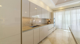 Double sink and flush black hob along the kitchen run at Bella Vista villa, Barbados