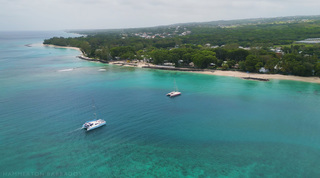 Catamarans moored off the west coast beach near Church Point 2, holiday villa in Holetown, Barbados