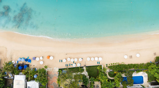 Sun loungers and umbrellas on Paynes Bay beach below Coral Cove 15 - Penthouse, Barbados