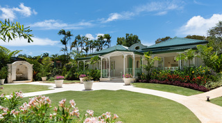 Garden cottage with a scrolled parapet and coral stone wall fountain, Crystal Springs, The Garden, Barbados