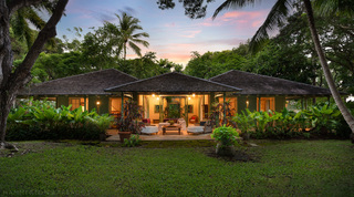 Dusk on the Plantation Wing and its lit open sitting court at Fustic House, villa rental in Barbados