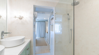 Glitter Bay 302 Bikini Bottom, Barbados, walk-in rain shower with a doorway through to the bedroom