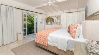 King bedroom with French doors to a garden-view balcony, Glitter Bay 302 – Bikini Top, Barbados