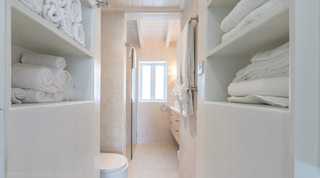 Glitter Bay 302 – Bikini Top bathroom with built-in linen shelving and walk-in shower, Barbados