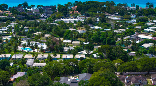 Aerial over the Sandy Lane estate towards the sea beyond Jamoon villa, Barbados