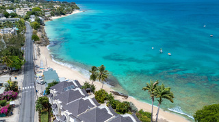 Aerial view of Paynes Bay beach and turquoise sea by Mahogany Bay – Chanel No.5, beachfront villa in Barbados