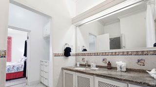 En-suite shower room adjoining the twin bedroom at Mahogany Bay – Chanel No.5 villa in Barbados