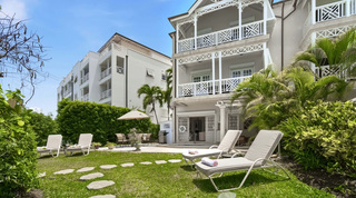 Garden loungers and a stepping-stone path at Mahogany Bay – Chanel No.5, a holiday villa rental in Barbados