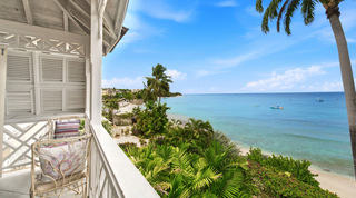 Bedroom balcony view over palms to the Caribbean Sea at Mahogany Bay – Chanel No.5, Paynes Bay, Barbados