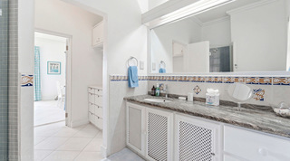 Granite vanity and walk-in mosaic shower in a white en-suite, Fathom's End, Barbados