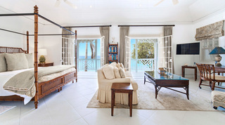 Master suite sitting area opening to the oceanfront balcony at Fathom's End, Mahogany Bay, Barbados