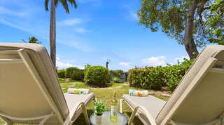 Sun loungers and chilled wine in the garden by the private beach gate, Fathom's End holiday villa, Barbados
