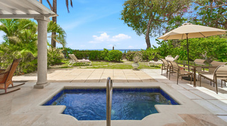 Private plunge pool and covered verandah steps from the sea at Fathom's End, a beachfront villa in Barbados