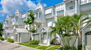 White colonial frontage and fretwork balconies at Mahogany Pod, Mahogany Bay 4, a luxury villa in Barbados
