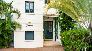 Green panelled entrance door with the Pandora nameplate at Mullins Bay 10 Pandora villa, Barbados