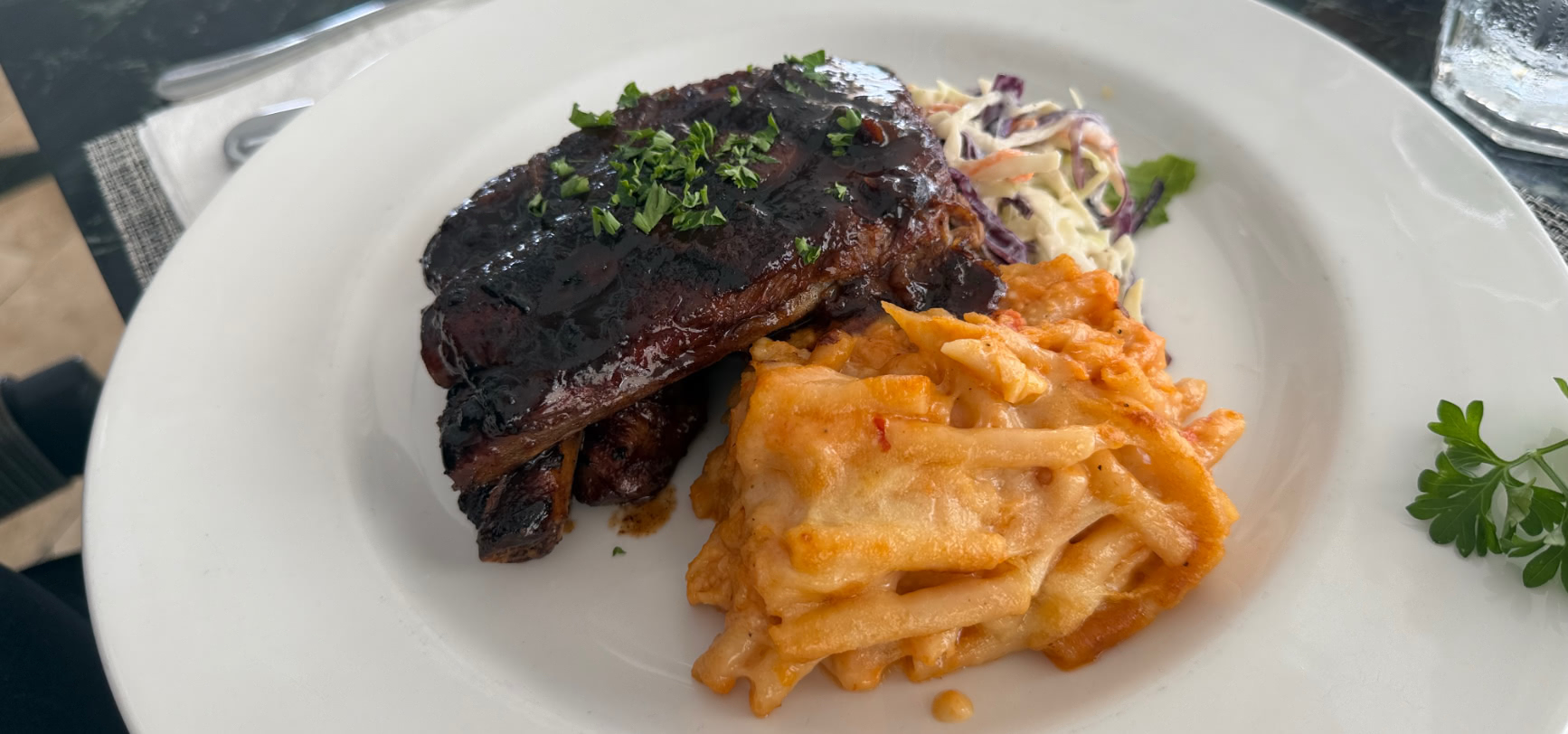 Barbecue pork ribs with Bajan macaroni pie and coleslaw at The Deck, Sugar Hill, Barbados