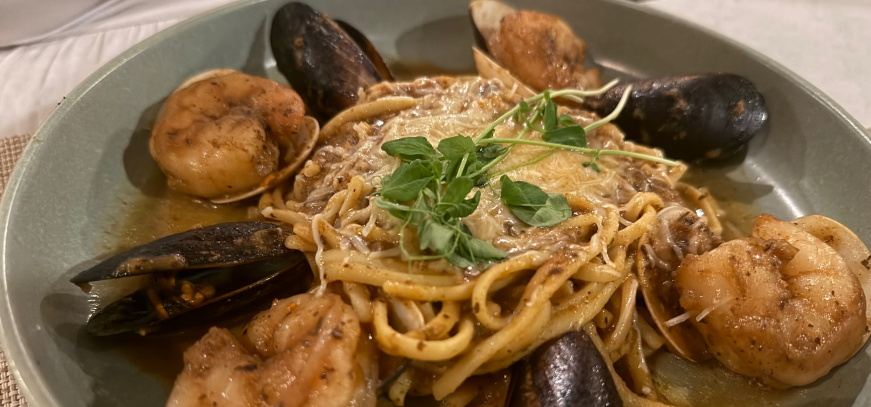 A generous Seafood Linguini — linguini ringed with prawns, mussels and clams