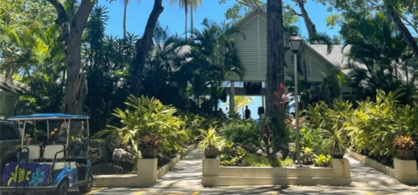 The entrance to the Sandy Lane Property Owners Beach Club