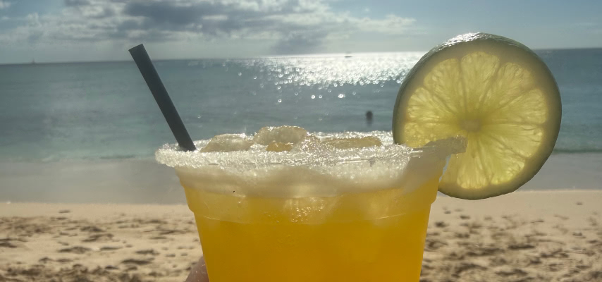 A cold drink on a west coast beach in Barbados