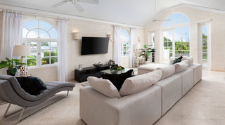 Open-plan living room with a pale sectional sofa beneath a vaulted ceiling, Royal Villa 17 luxury villa, Barbados