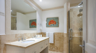 Double-basin vanity and painted crab art in a bathroom at Sugar Cane Ridge 21 – Ruby Blue, Barbados