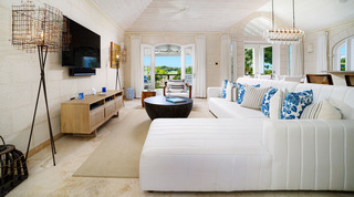 Vaulted living room, chaise sofa and open doors to the golf view at Sugar Cane Ridge 21 – Ruby Blue, Barbados holiday villa