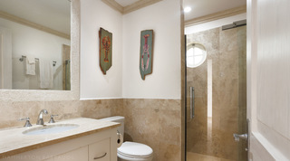 Porthole window in the glass shower and painted lobster and langoustine art, Sugar Cane Ridge 21 – Ruby Blue in Barbados