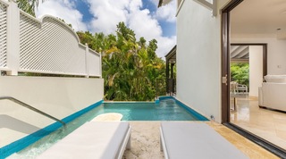 Private plunge pool and sun loungers behind a white lattice screen, Tree House Villa 5, Apes Hill, Barbados