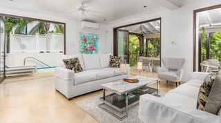 Sitting room with the plunge pool just beyond the open doors, Tree House Villa 5, holiday villa in Barbados