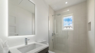 Bathroom at Westmoreland Hills 25 with single vanity and glazed walk-in rain shower, Barbados