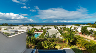 Wide panorama from Westmoreland Hills 25 over the community and gardens to the ocean, Barbados
