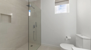Walk-in shower room at Westmoreland Hills 25 with rain head and tiled niche, Barbados