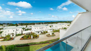 Elevated outlook over the gated community and pool corner to the sea, Westmoreland Hills 25, Barbados